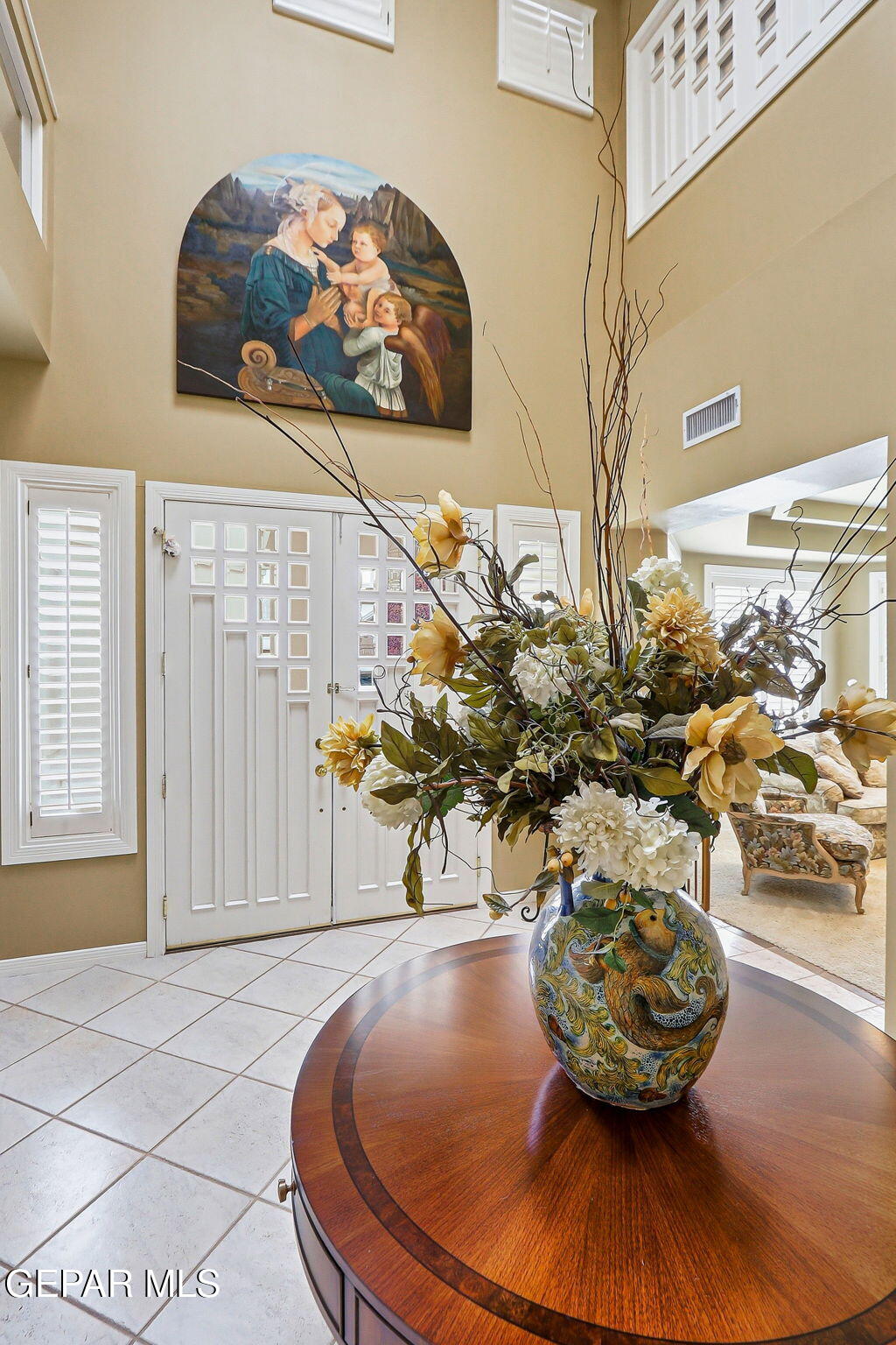 5806 Diamond Point Circle El Paso, TX 79912 - Photo 3 of 61 a view of a living room with furniture and a potted plant