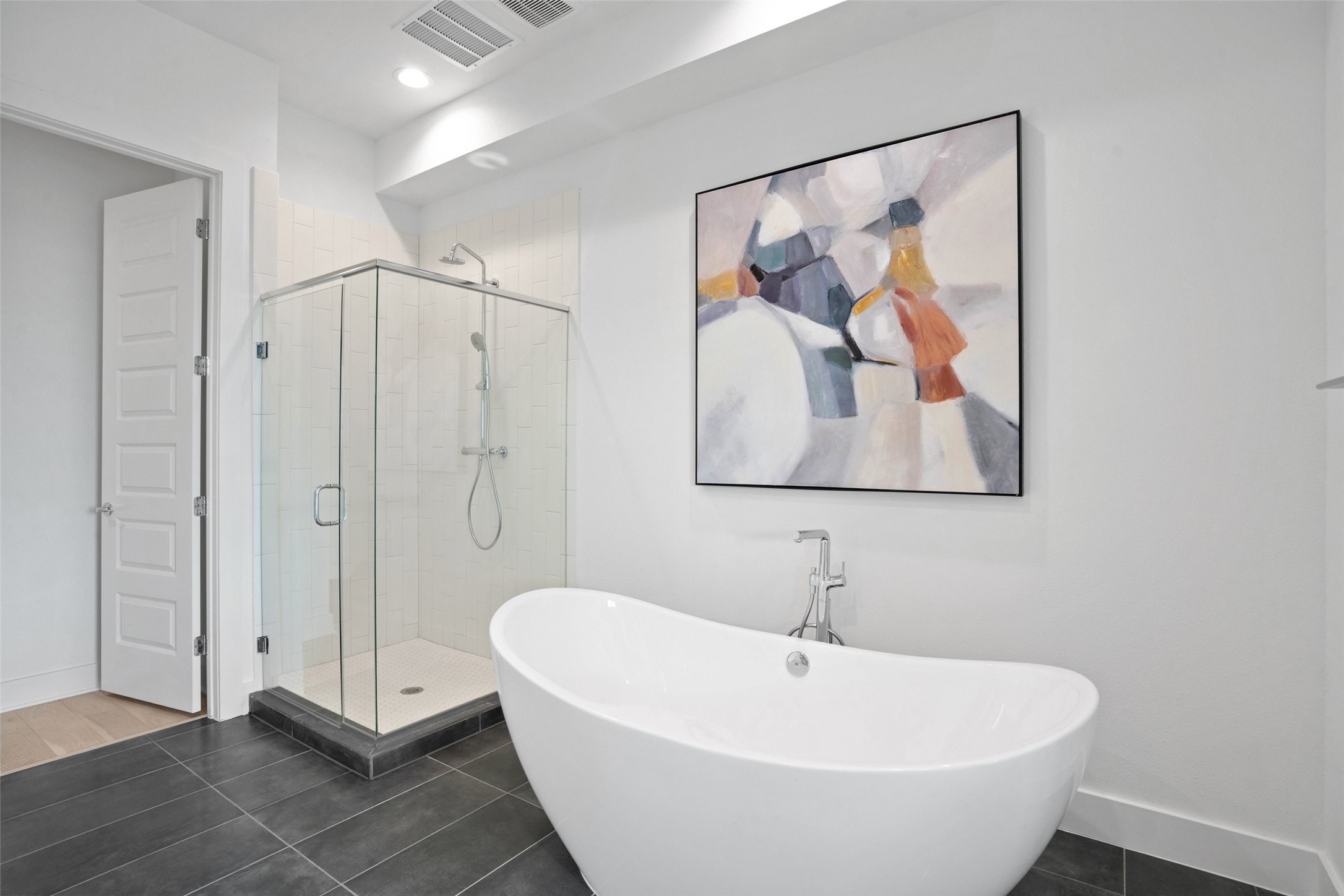 2805 McCurdy Street, Unit 2 Austin, TX 78723 - Photo 16 of 34 a white bath tub sitting next to a white wall