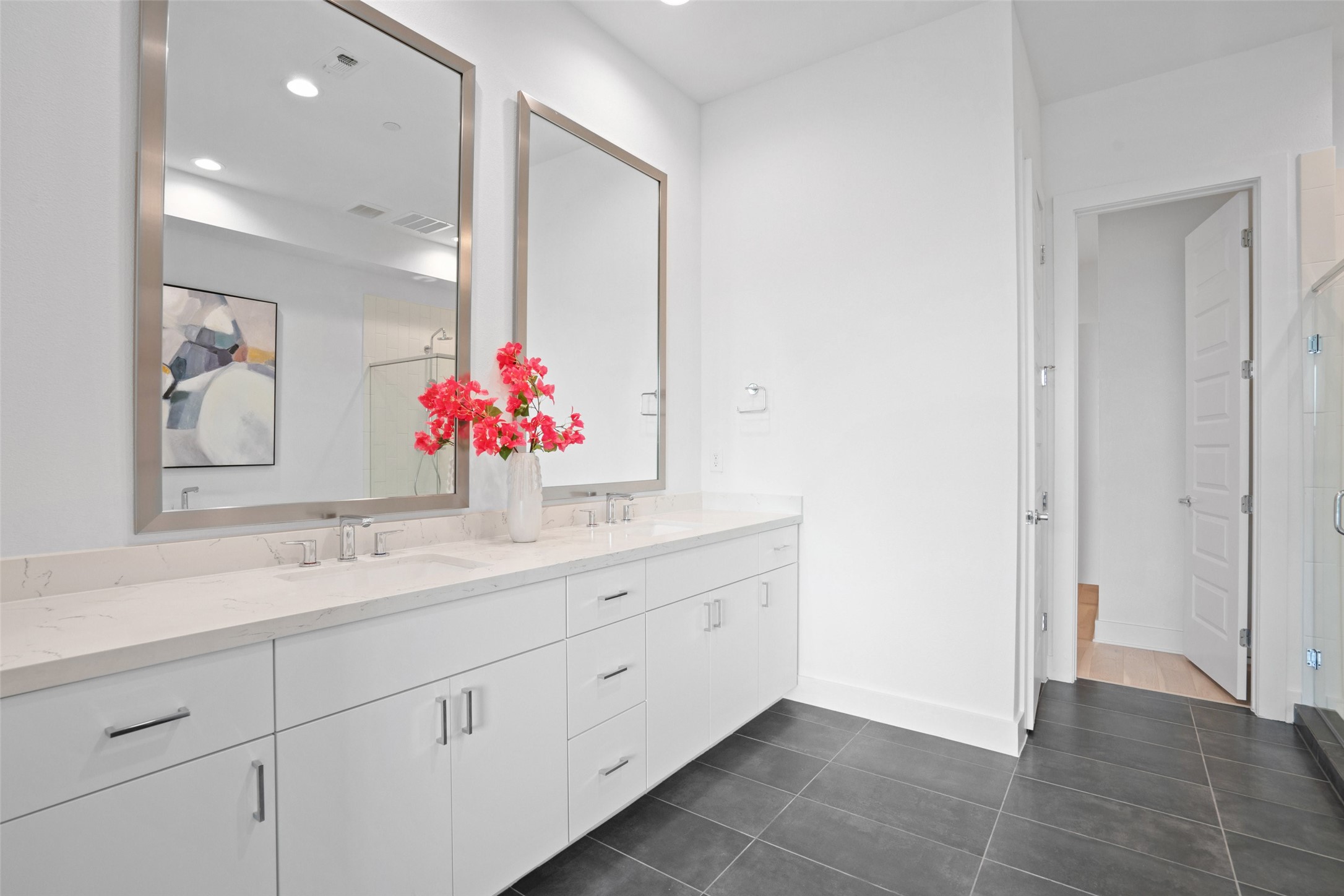 2805 McCurdy Street, Unit 2 Austin, TX 78723 - Photo 17 of 34 a bathroom with a sink vanity and mirror