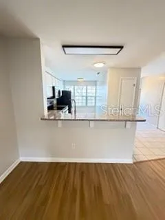 a view of empty room with windows