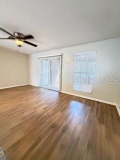 11019 Yorkshire Ridge Court Orlando, FL 32837 - Photo 8 of 15 wooden floor in an empty room