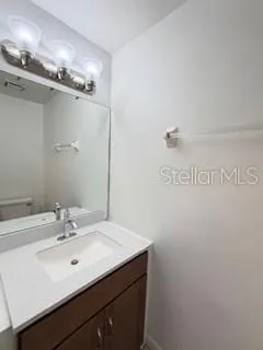 a bathroom with a bath tub and a toilet