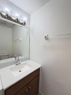 11019 Yorkshire Ridge Court Orlando, FL 32837 - Photo 10 of 15 a bathroom with a sink mirror and a shower