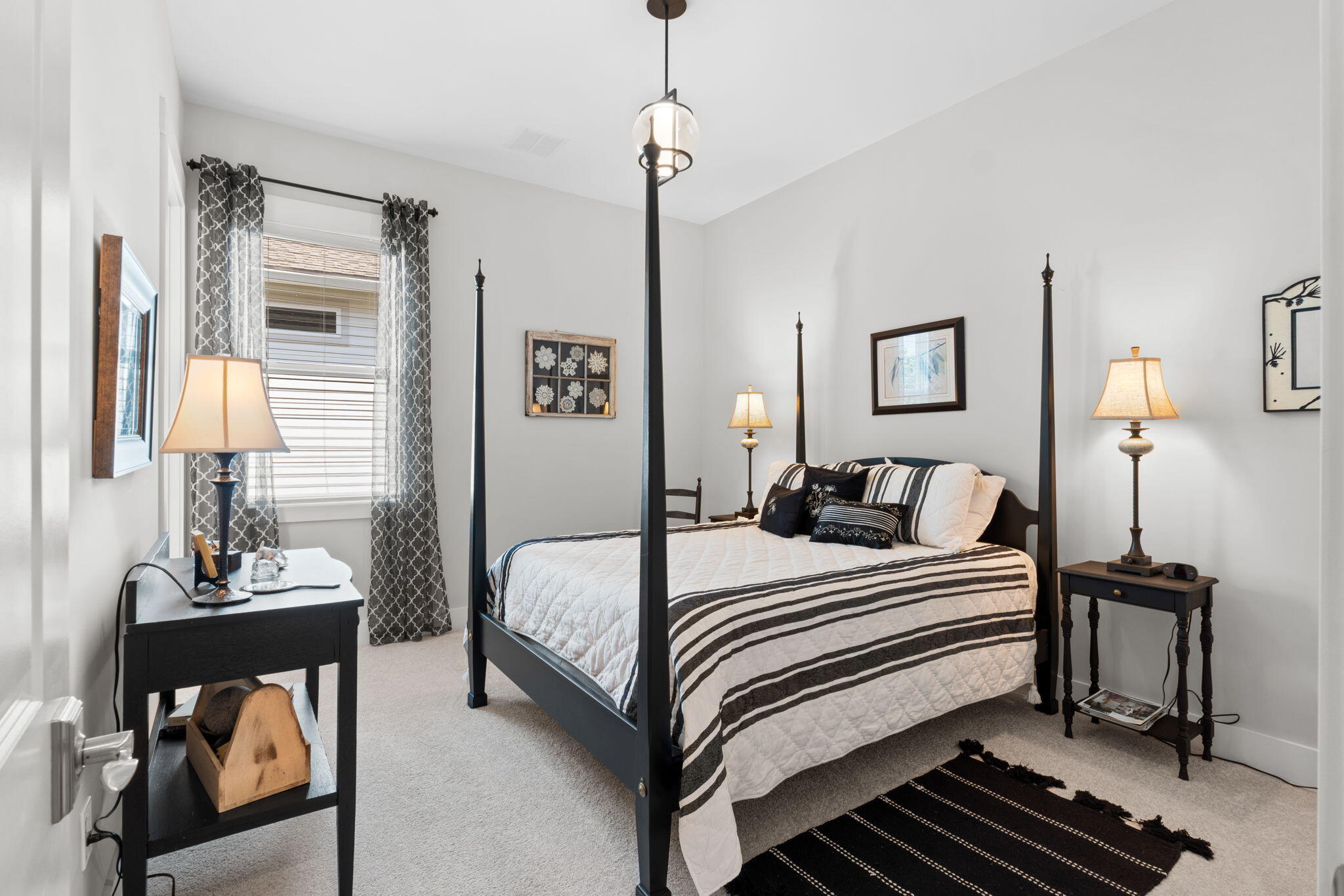 121 West Lafayette Rd Inlet Beach Inlet Beach, FL 32461 - Photo 22 of 41 a bedroom with a bed and a lamp on table