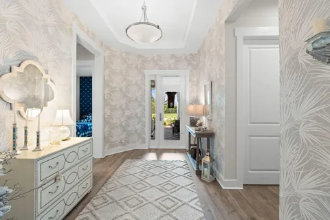 a bathroom with a sink a mirror and a shower