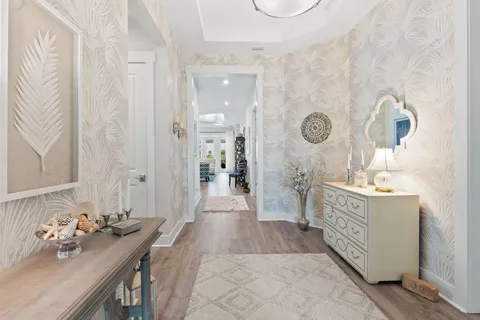 a spacious bathroom with a sink a mirror a vanity and shower