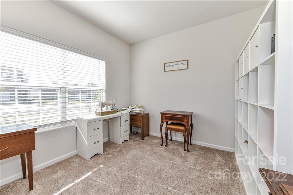 6727 Jerimoth Charlotte, NC 28215 - Photo 25 of 30 a view of a workspace with furniture and a window