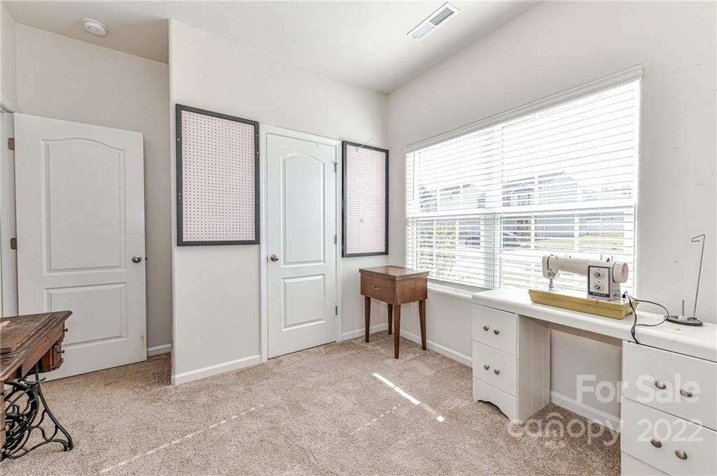 6727 Jerimoth Charlotte, NC 28215 - Photo 26 of 30 a room with a desk and a window