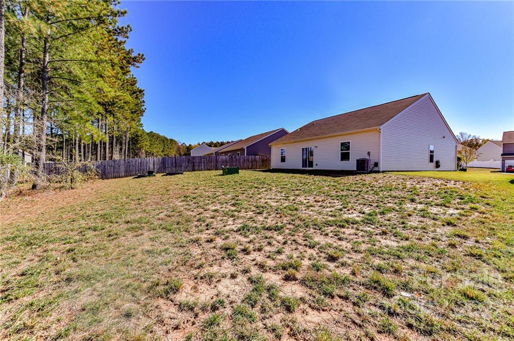 6727 Jerimoth Charlotte, NC 28215 - Photo 28 of 30 a view of a house with a big yard