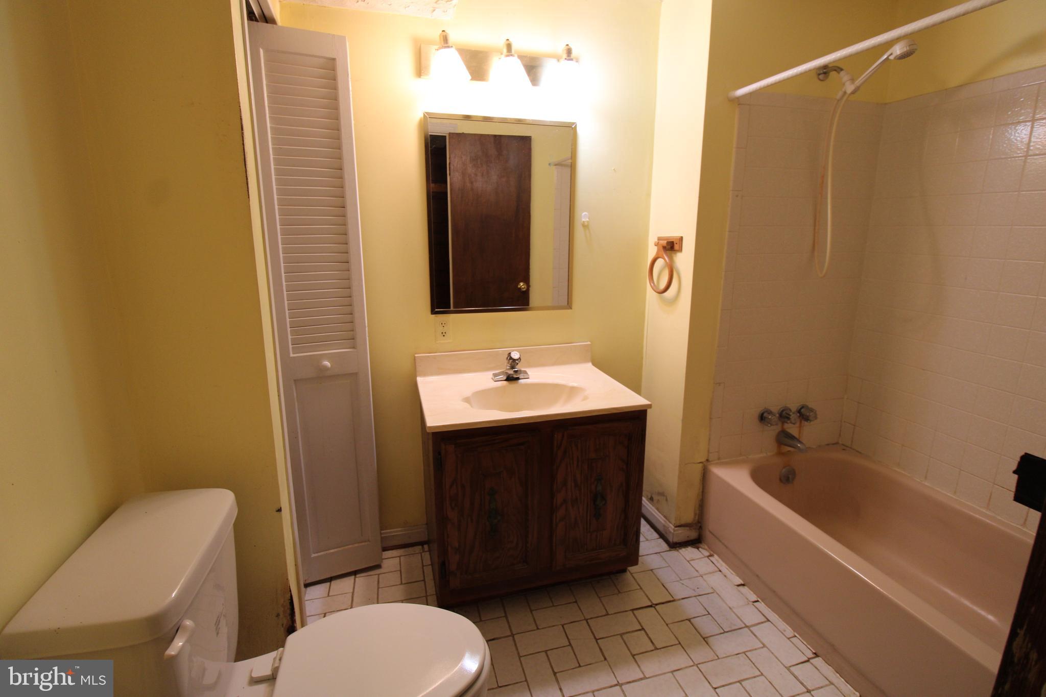 29778 Oak Road Mechanicsville, MD 20659 - Photo 19 of 22 a bathroom with a sink toilet and shower