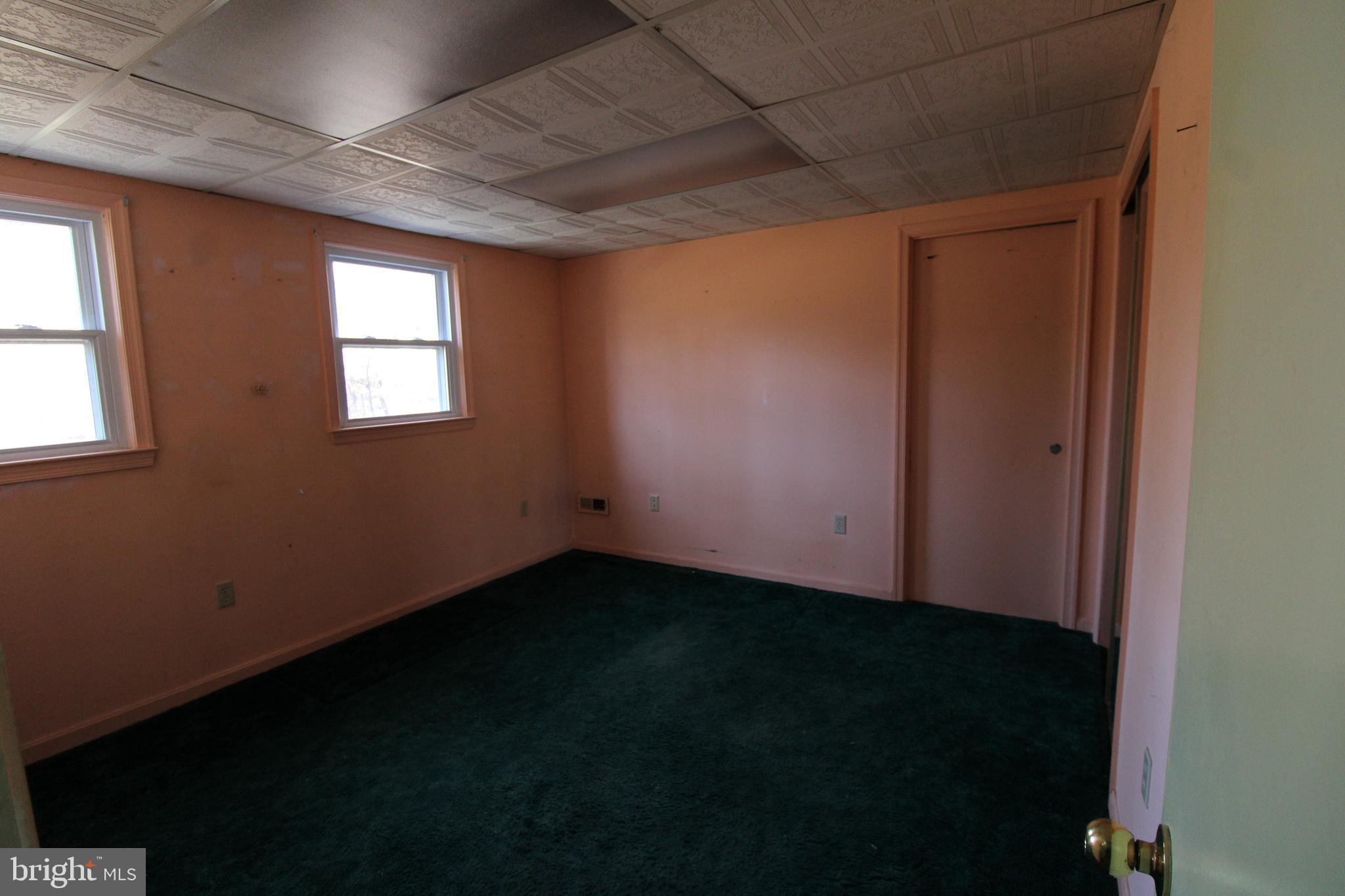29778 Oak Road Mechanicsville, MD 20659 - Photo 22 of 22 a view of an empty room with a window