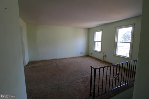 a view of hallway with windows