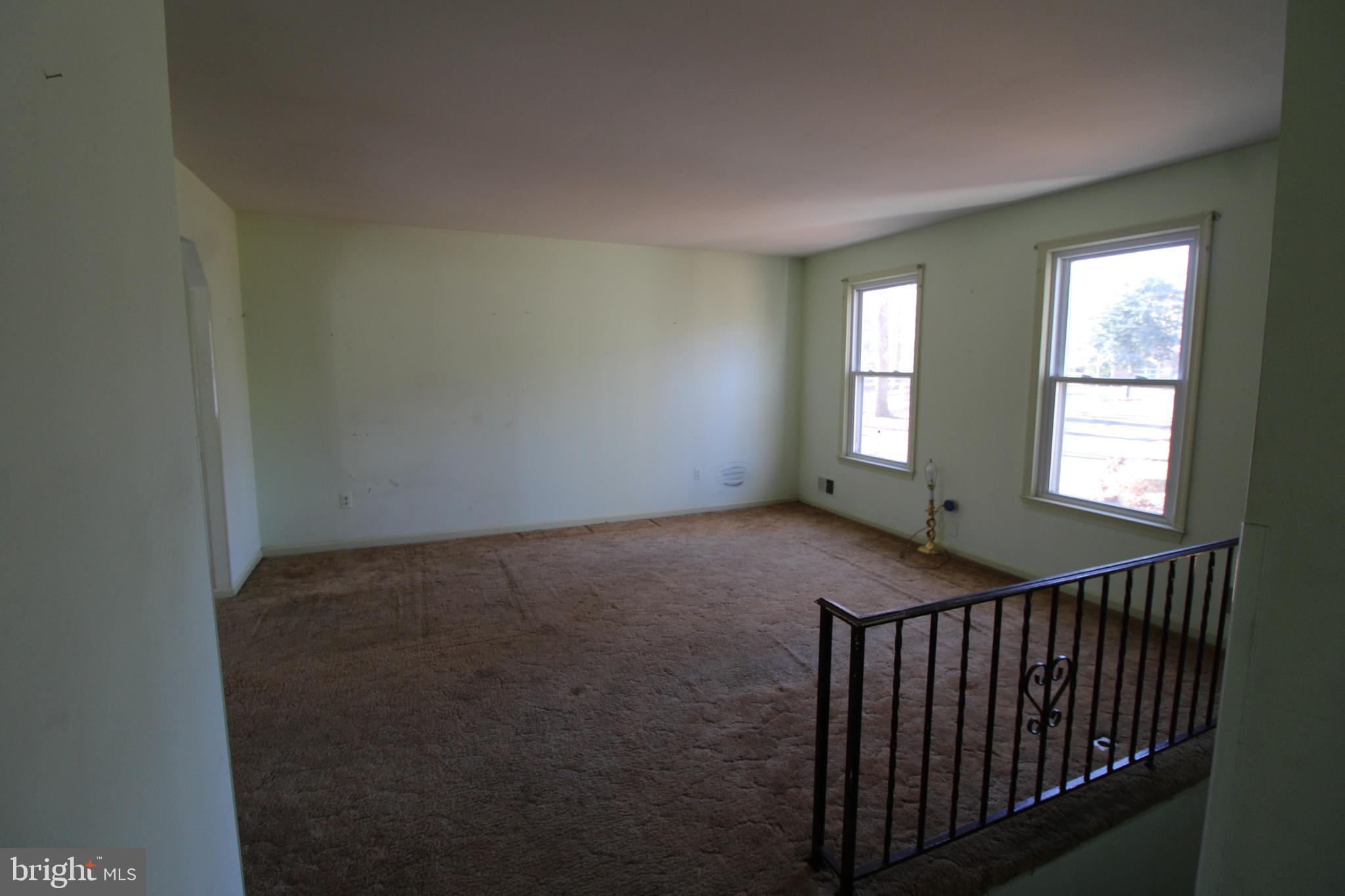 29778 Oak Road Mechanicsville, MD 20659 - Photo 7 of 22 a view of hallway with windows