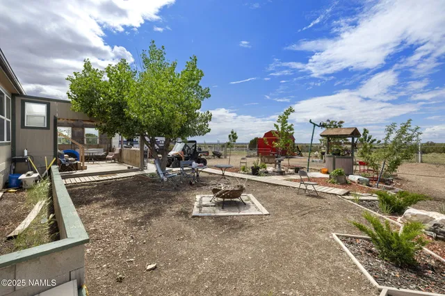 a view of a street with a building in the background