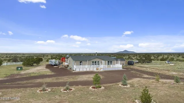 a view of a town with palm trees