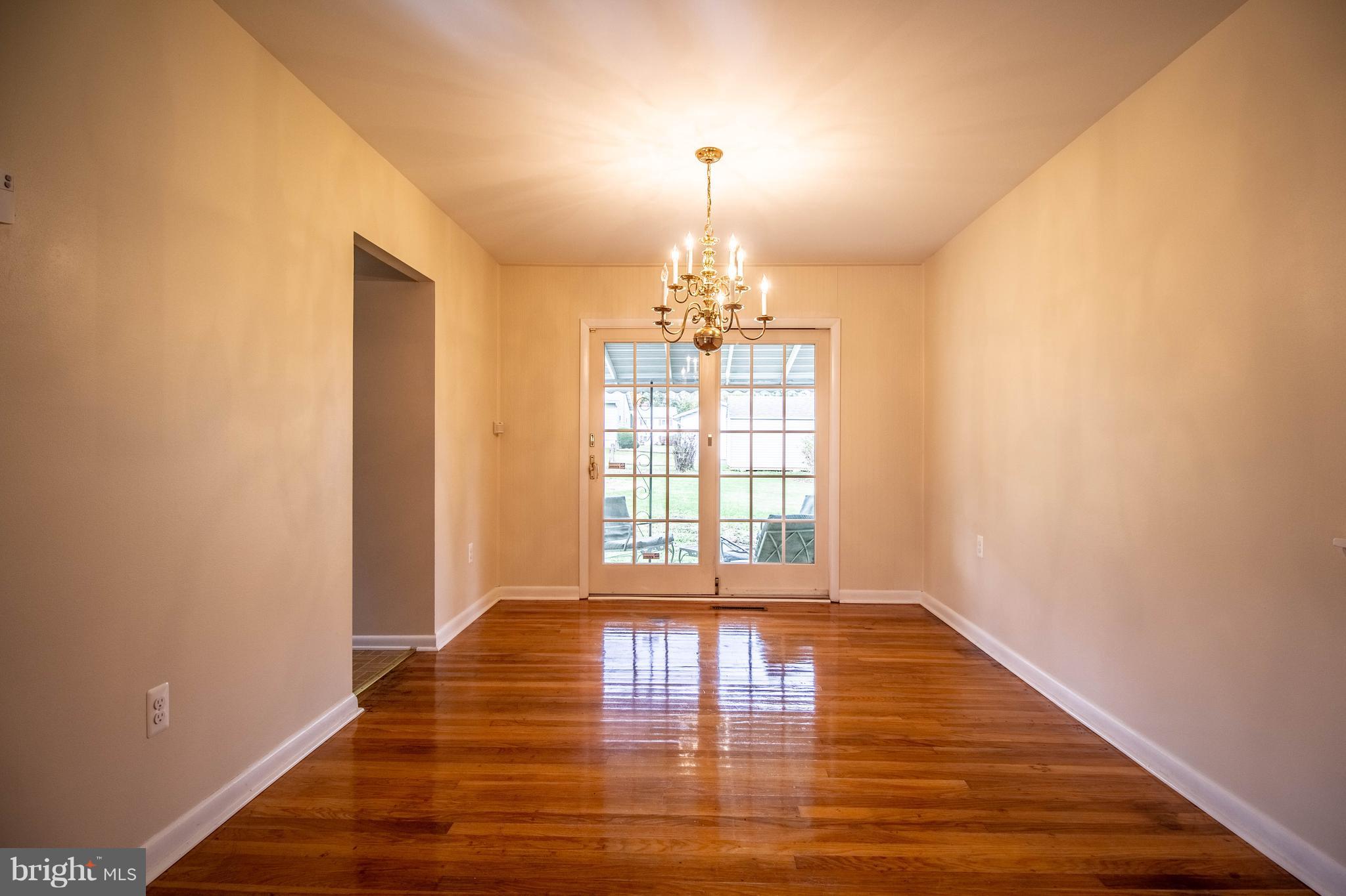 1213 Canberwell Road Baltimore, MD 21228 - Photo 4 of 30 Separate Dining Room Hardwood Floors!