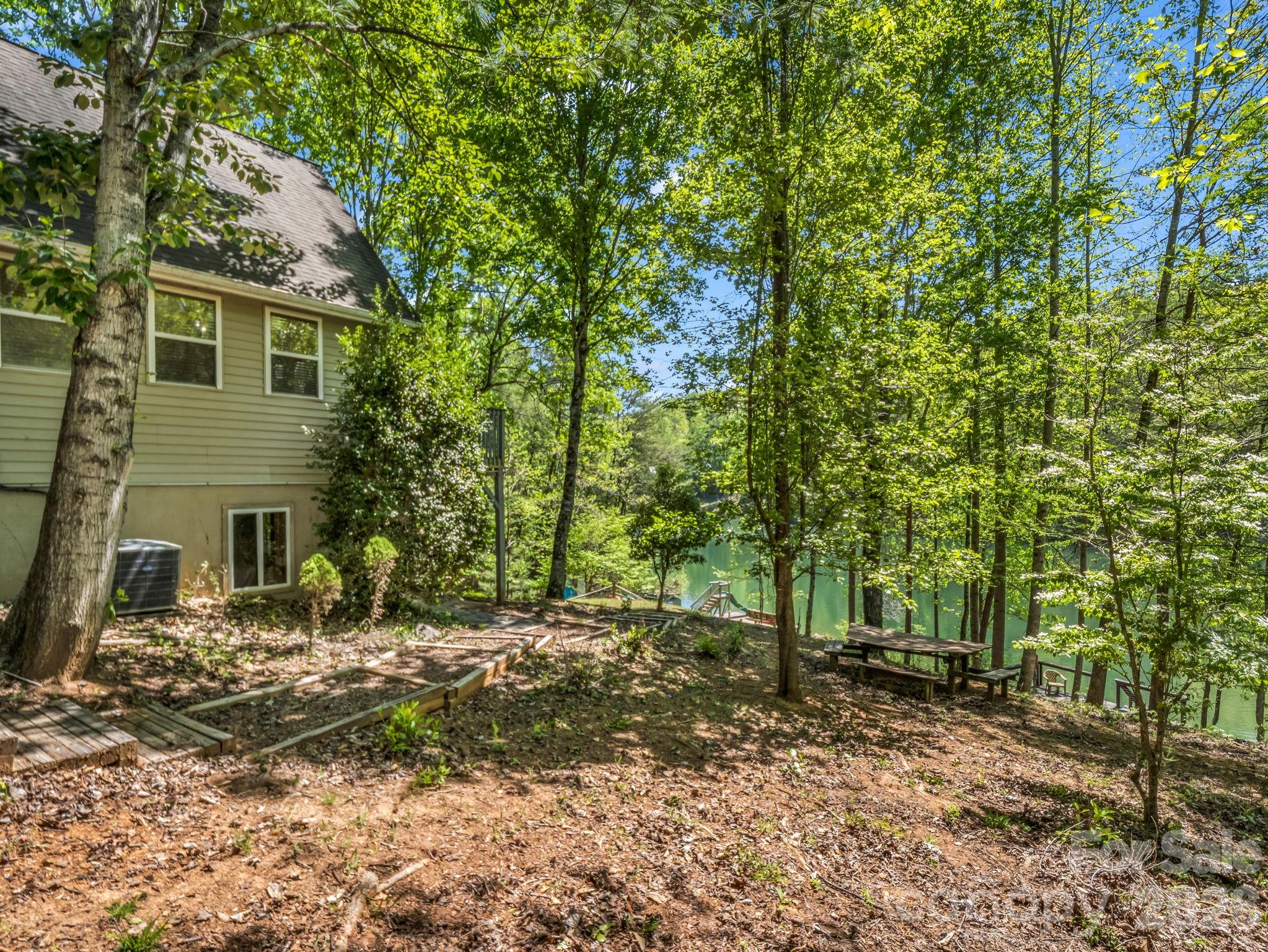 268 Mallard Road Lake Lure, NC 28746 - Photo 11 of 44 a view of a house with a yard