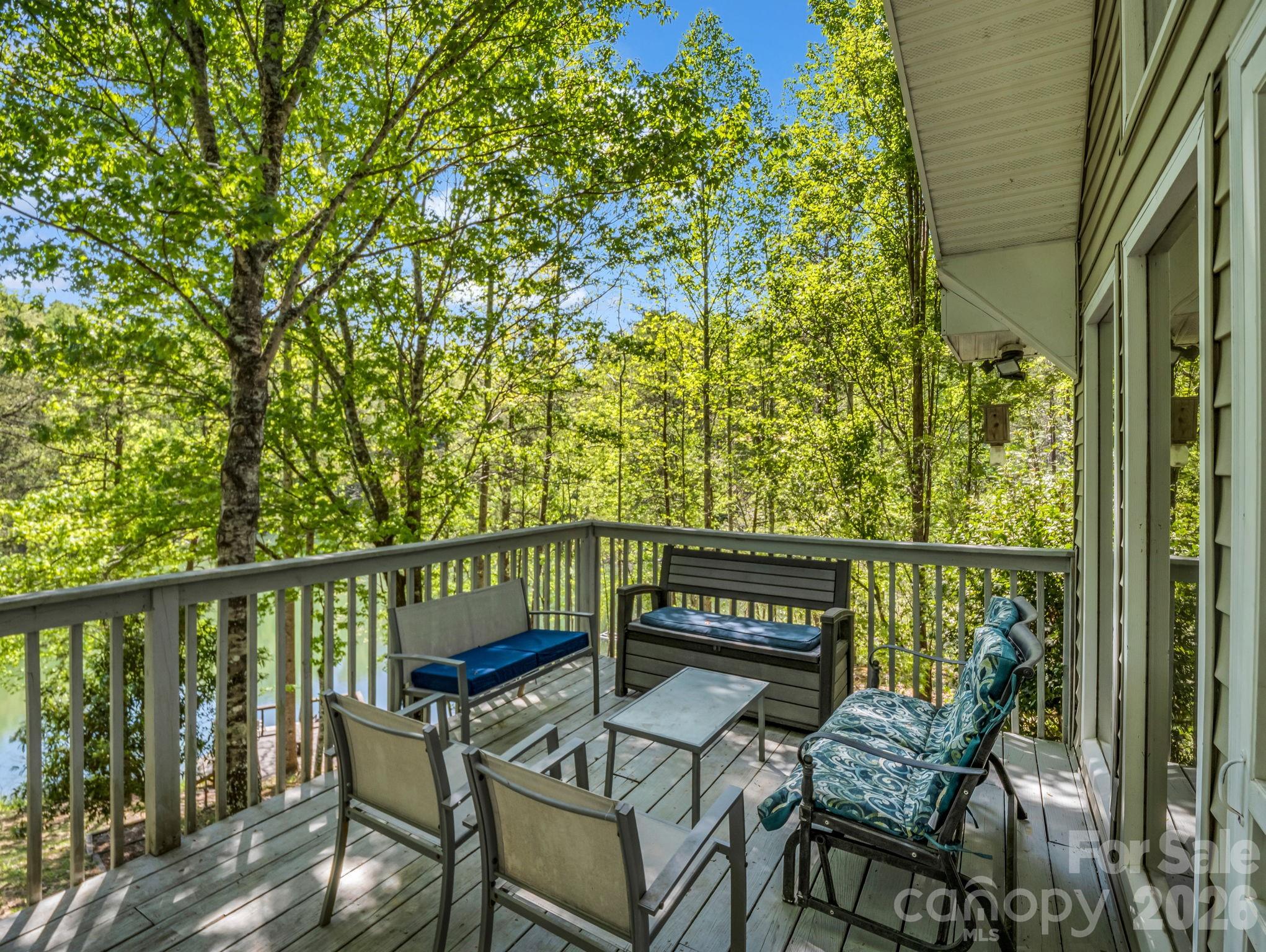 268 Mallard Road Lake Lure, NC 28746 - Photo 18 of 44 a view of a chairs and table in patio