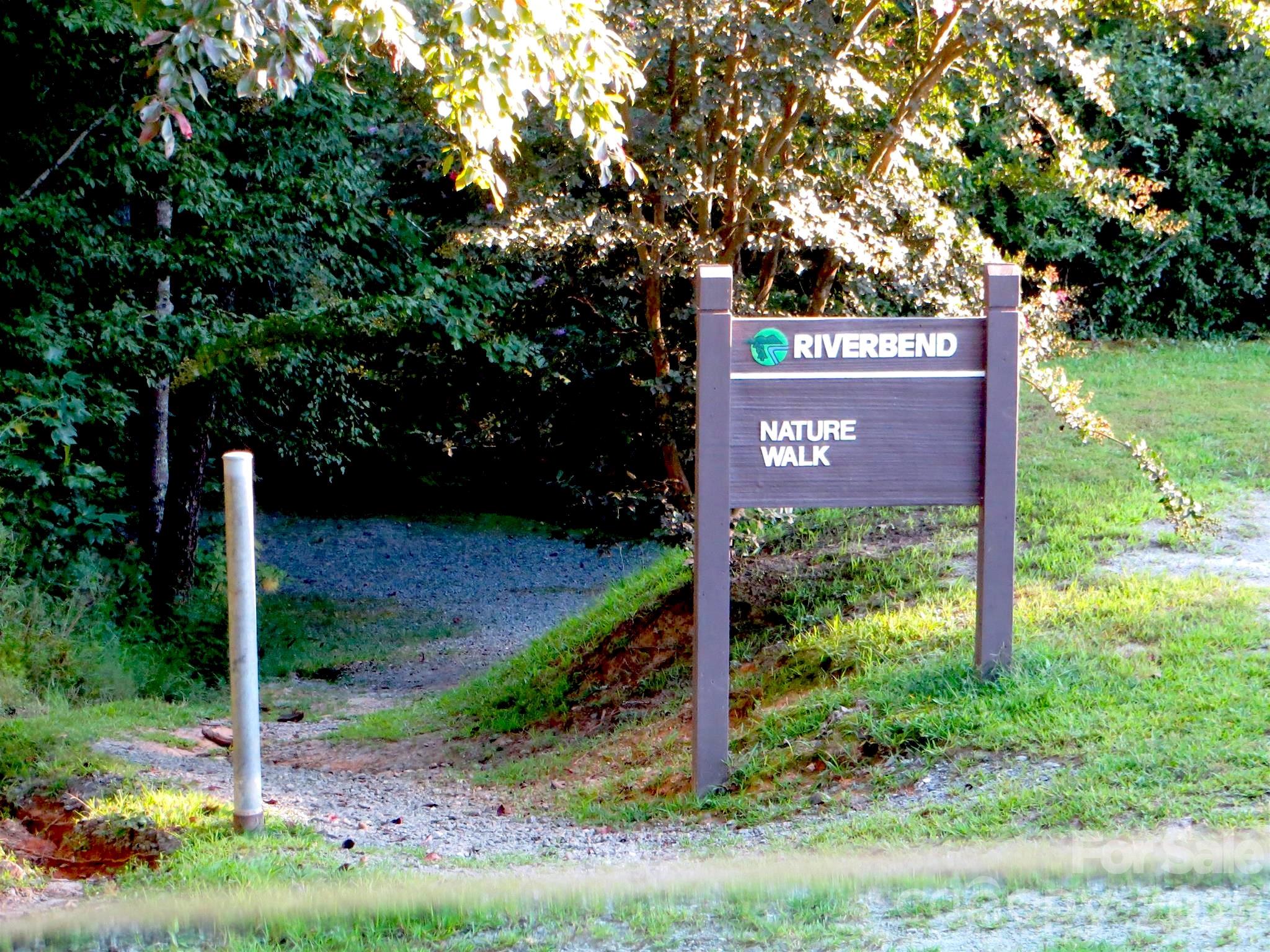 268 Mallard Road Lake Lure, NC 28746 - Photo 41 of 44 a sign on the side of the tree