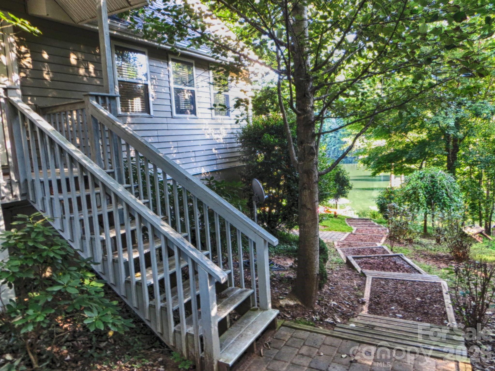 268 Mallard Road Lake Lure, NC 28746 - Photo 9 of 44 a view of a house with backyard and deck