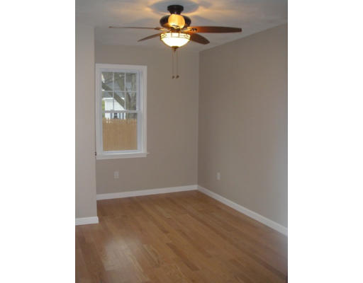6 Morse Road Sutton, MA 01590 - Photo 10 of 16 a view of a room with wooden floor and chandelier fan