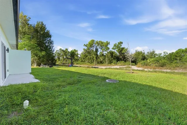 a view of a golf course with a garden