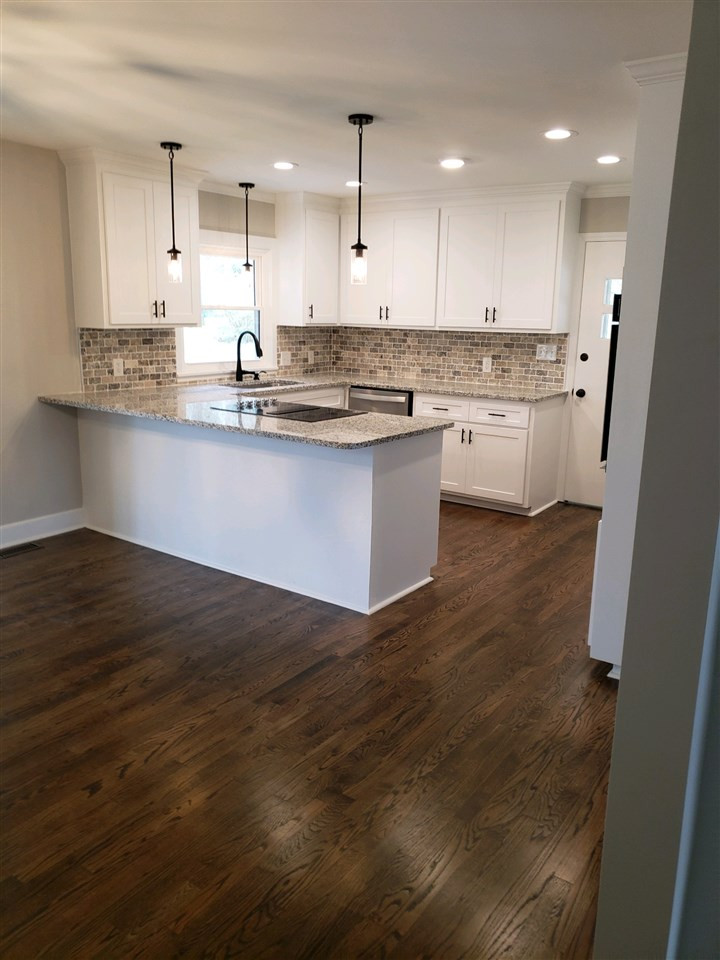 611 Wofford Road Durham, NC 27707 - Photo 10 of 30 Original Hardwoods refinished, plus hardwoods added in the kitchen, dining area and the sunroom Hardwoods