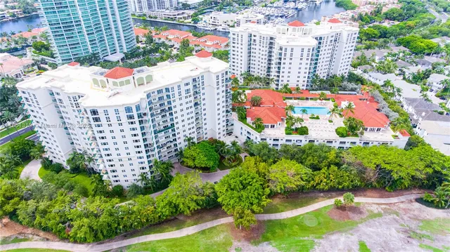 a balcony with lots of green space