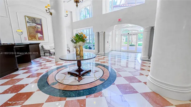 a vase of flowers sitting on a table
