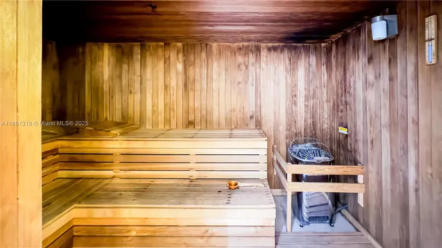 a view of room with a table and chairs