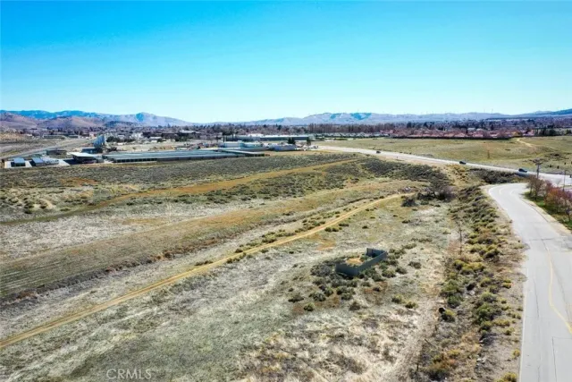 a view of a lake with mountains in the background