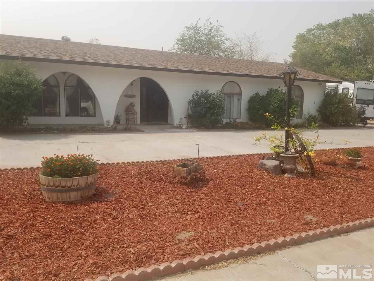 a house view with a outdoor space