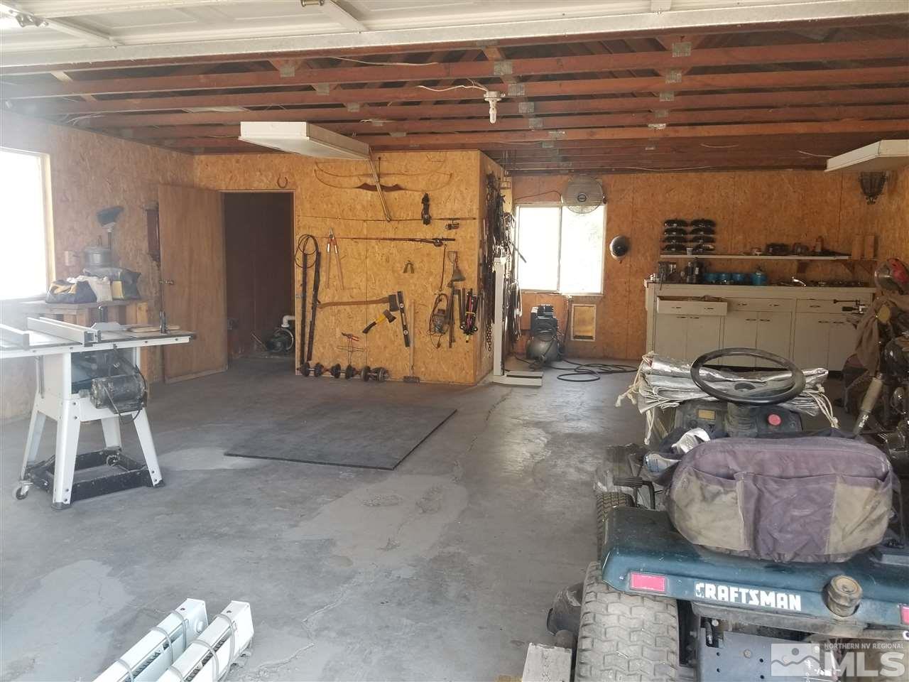 2555 Soda Lake Road Fallon, NV 89406 - Photo 36 of 40 a room with a table and chairs