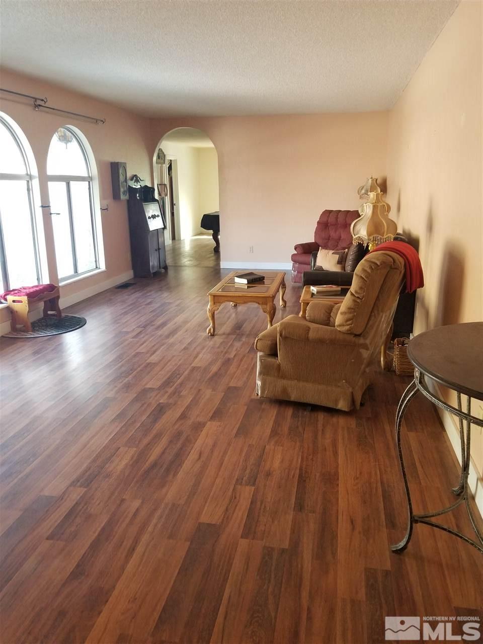2555 Soda Lake Road Fallon, NV 89406 - Photo 5 of 40 a living room with furniture and a fireplace