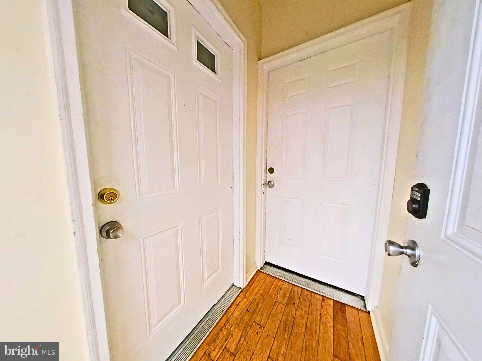 1422 Willington Street, Unit 2 Philadelphia, PA 19121 - Photo 8 of 25 a view of a entryway door with wooden floor