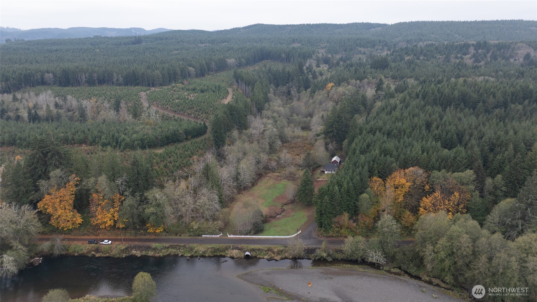 763 Geissler Road Montesano, WA 98563 - Photo 17 of 31 a view of a lake with a mountain