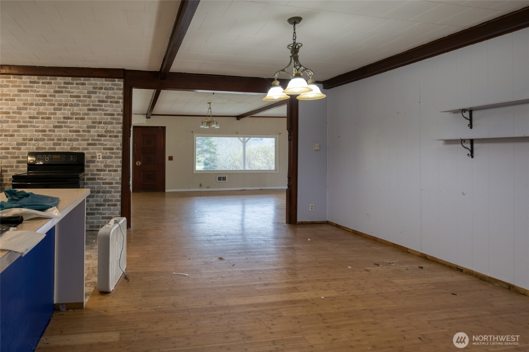 763 Geissler Road Montesano, WA 98563 - Photo 19 of 31 wooden floor in an empty room with a window