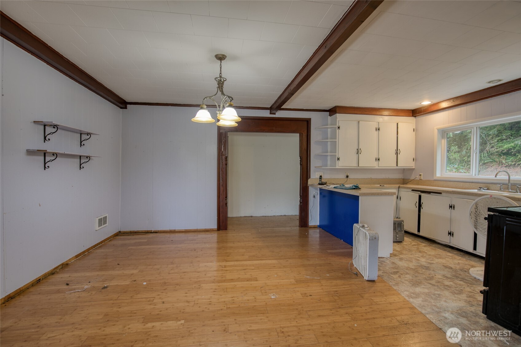 763 Geissler Road Montesano, WA 98563 - Photo 25 of 31 a view of a kitchen with a sink and cabinets