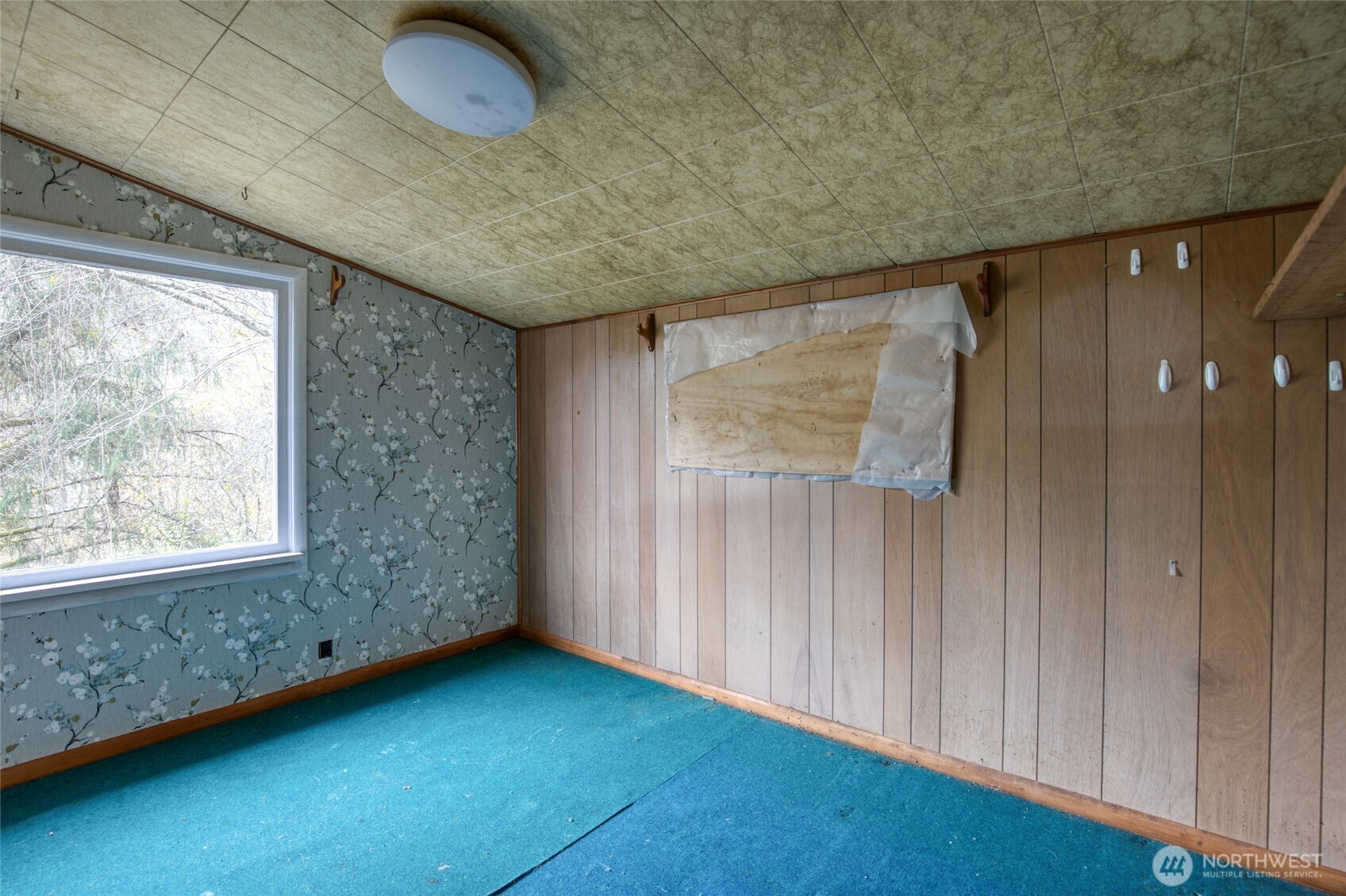 763 Geissler Road Montesano, WA 98563 - Photo 26 of 31 a view of an empty room with a window