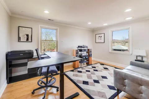 a view of a livingroom with furniture and window