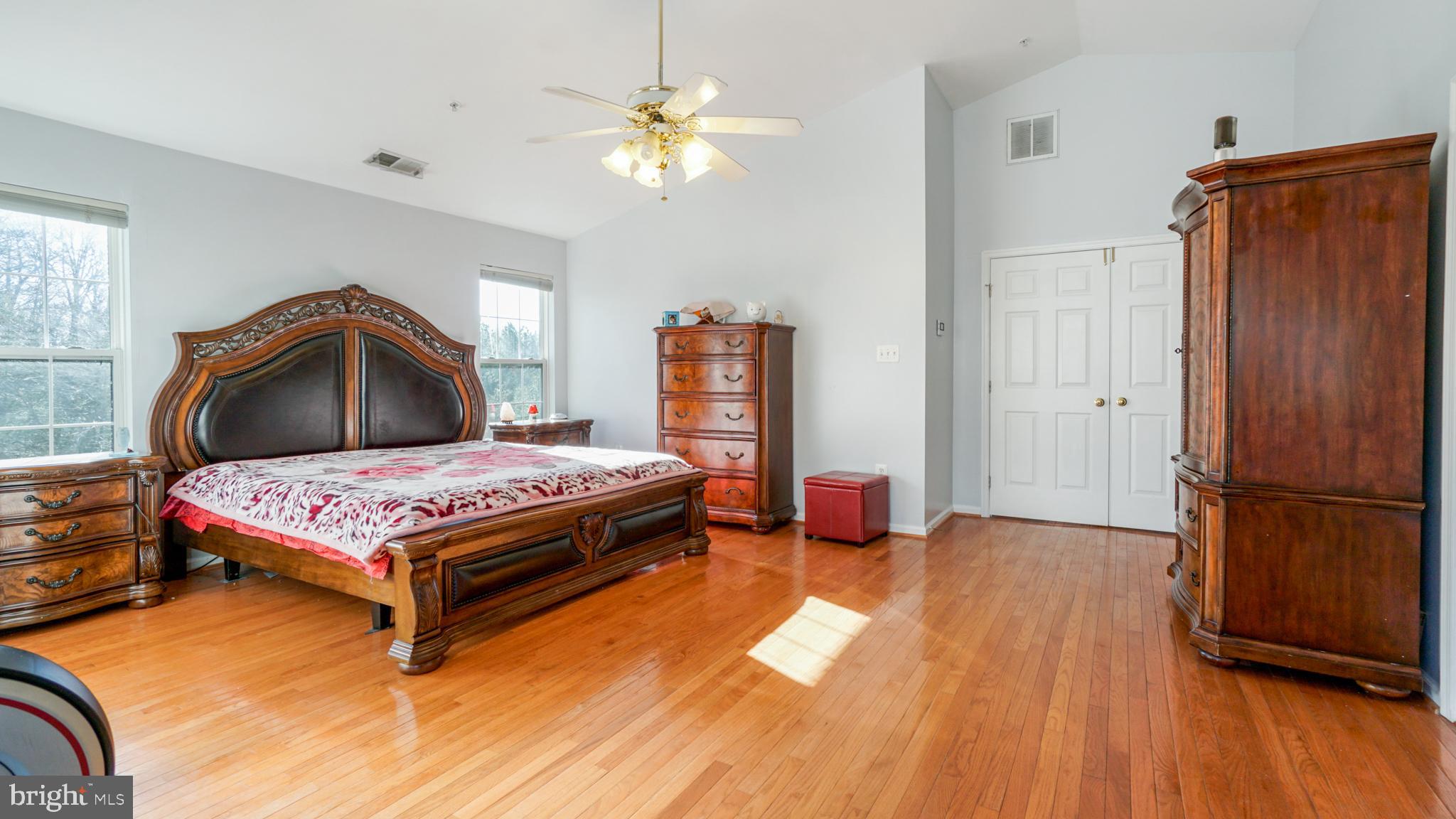 9626 Stuart Lane Clinton, MD 20735 - Photo 16 of 29 master bedroom with sitting area ,hardwood floors