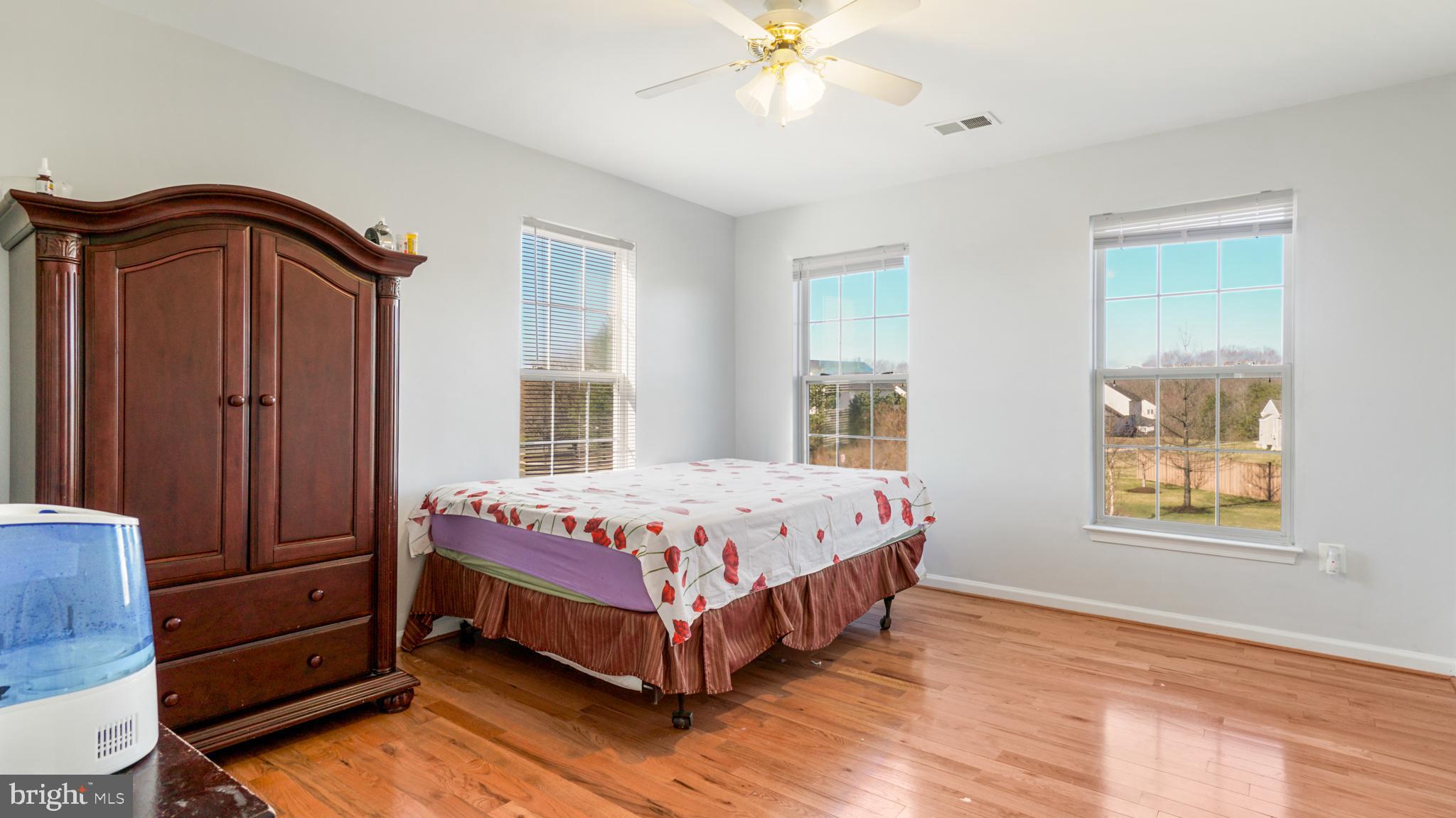 9626 Stuart Lane Clinton, MD 20735 - Photo 18 of 29 4th bedroom ,hardwood floors