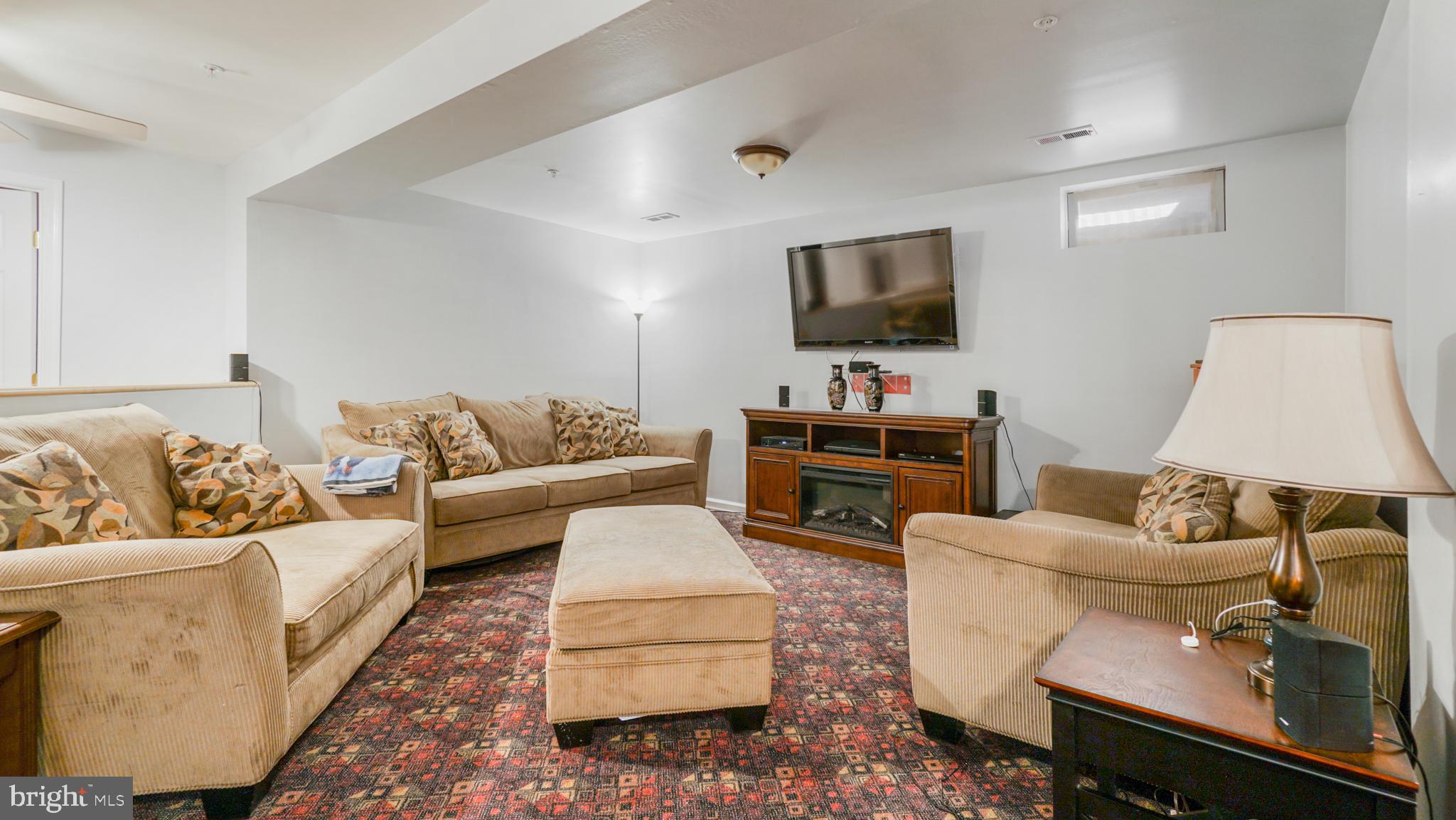 9626 Stuart Lane Clinton, MD 20735 - Photo 23 of 29 rec room in the basement