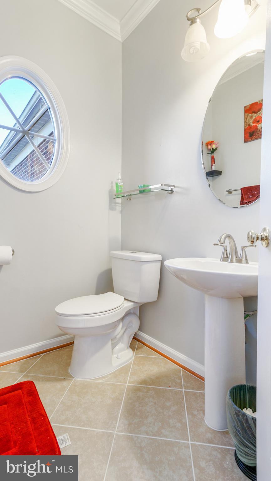 9626 Stuart Lane Clinton, MD 20735 - Photo 26 of 29 powder room lower level , new tiles