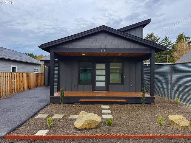 a front view of a house with entertaining space