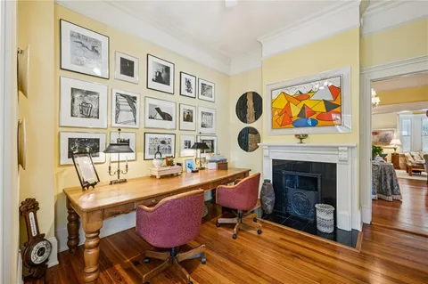 a view of a livingroom with furniture and a fireplace
