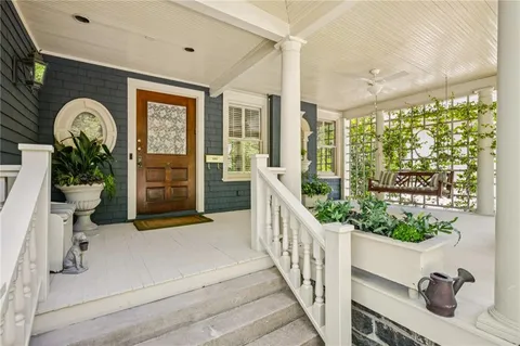a view of a porch with furniture