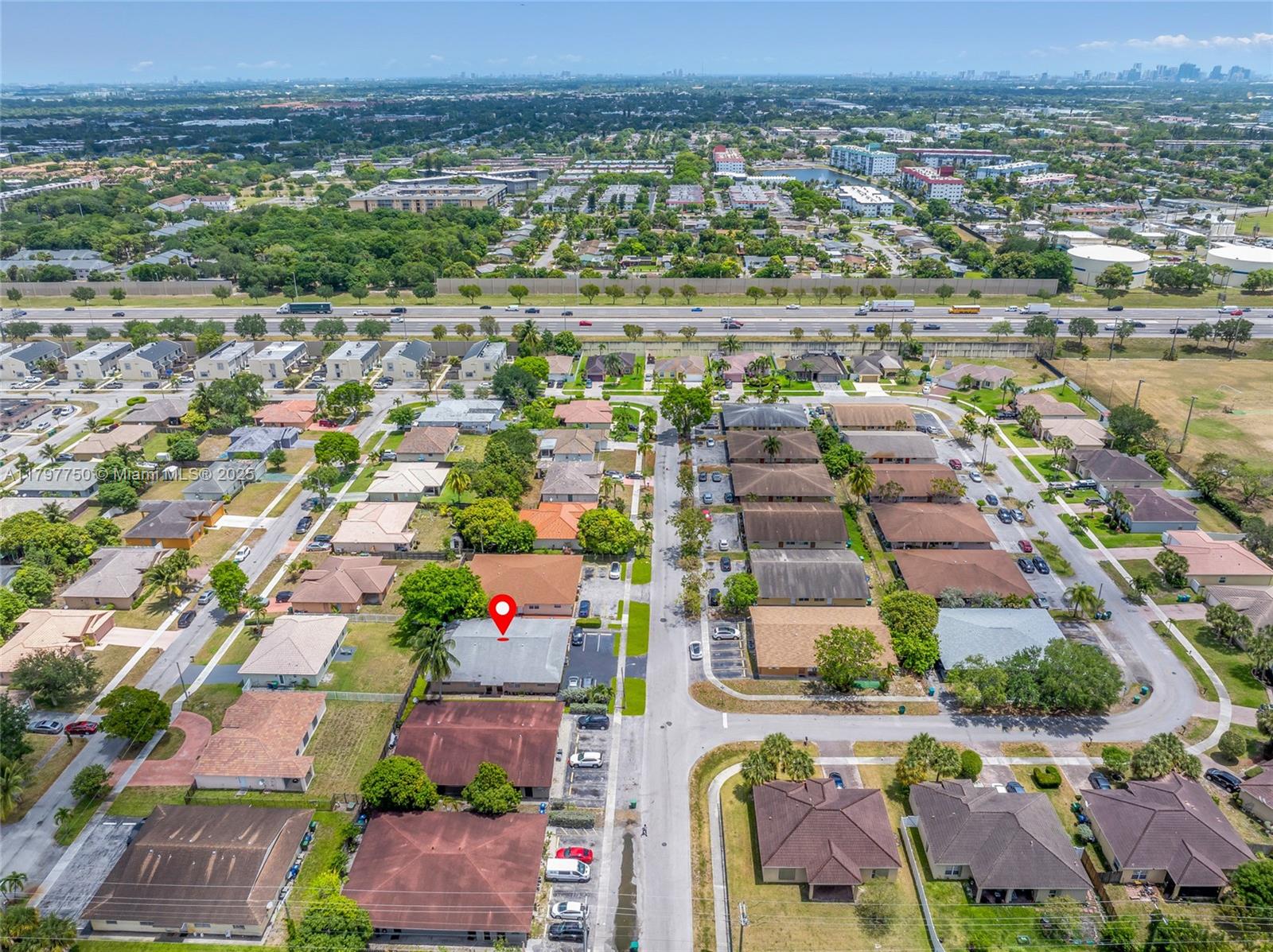 5321 Northwest 22nd Street Lauderhill, FL 33313 - Photo 7 of 10 an aerial view of residential building and lake