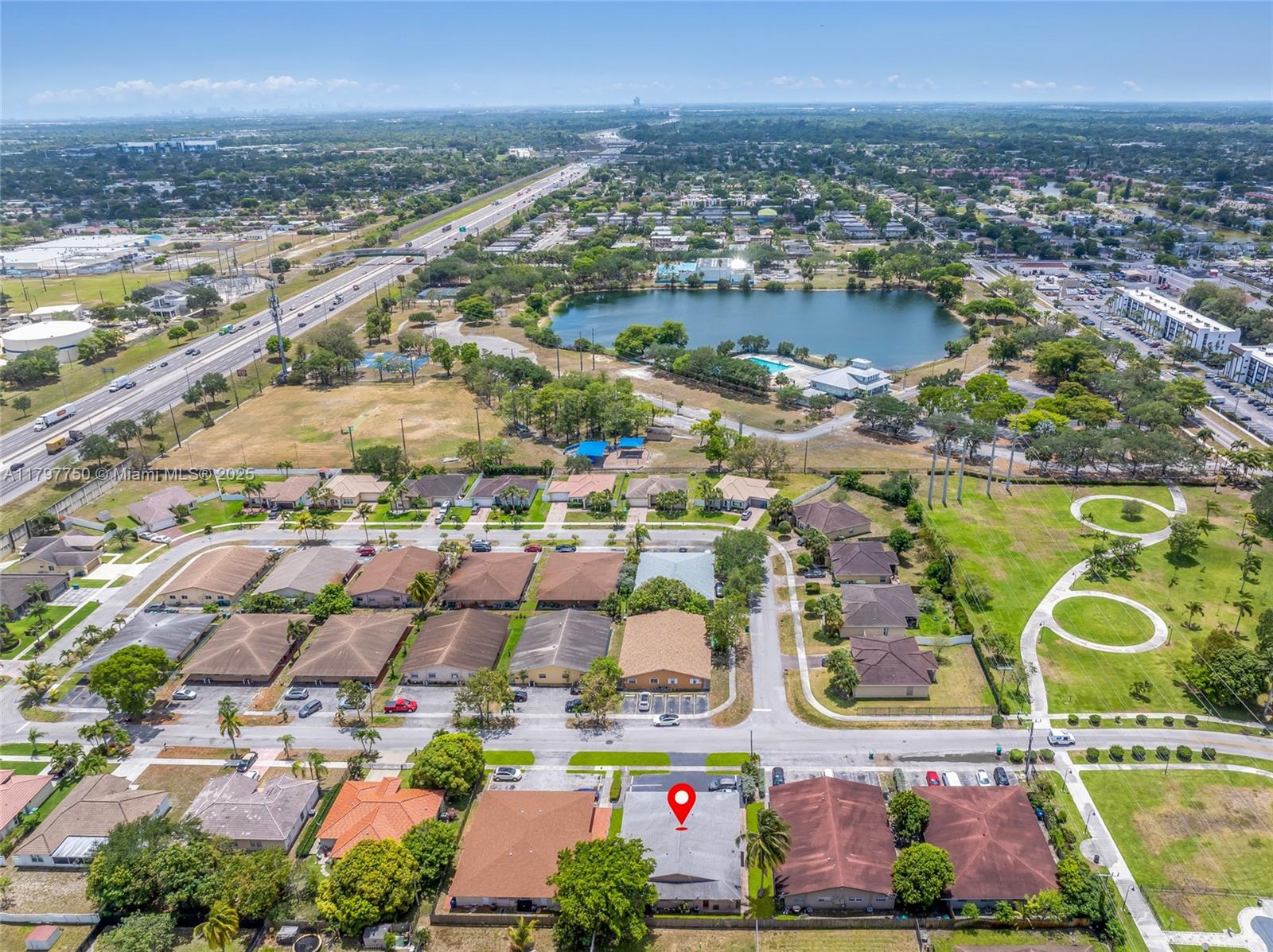 5321 Northwest 22nd Street Lauderhill, FL 33313 - Photo 8 of 10 an aerial view of residential building and lake