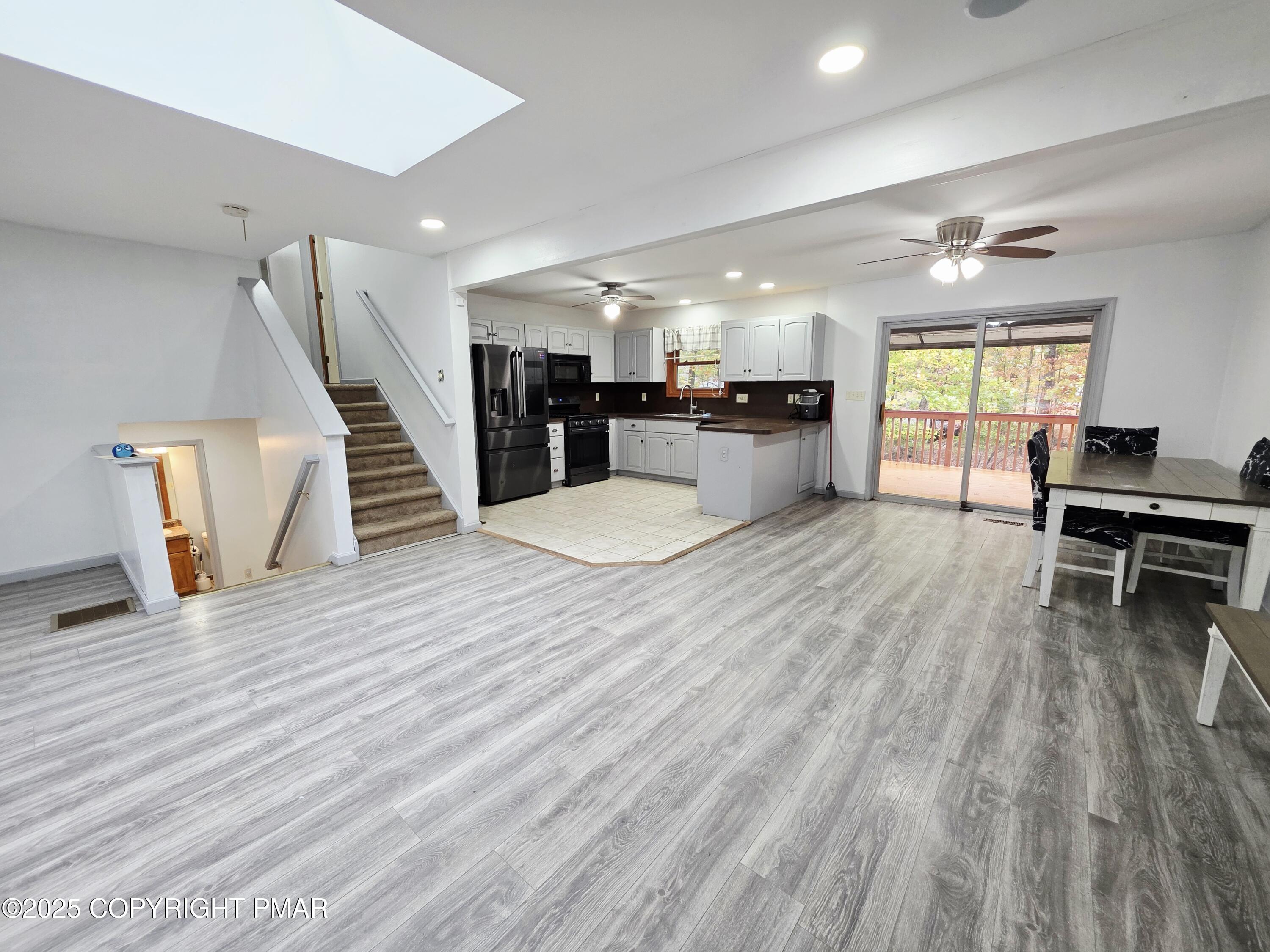 1001 Long Lake Road Tamiment, PA 18371 - Photo 38 of 38 a view of kitchen with furniture and wooden floor